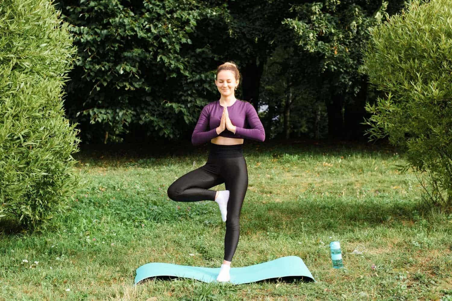 young-woman-practicing-yoga-asana-balance-medita-2022-02-15-18-23-50-utc-2-min.jpg